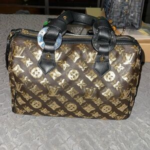 Preloved Louis Vuitton sequence excellent condition comes with dust bag .